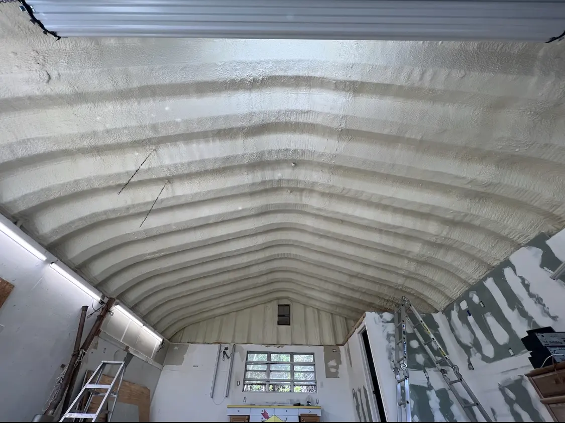 Spray polyurethane foam applied to the underside of a metal roof deck in Hermosa Beach